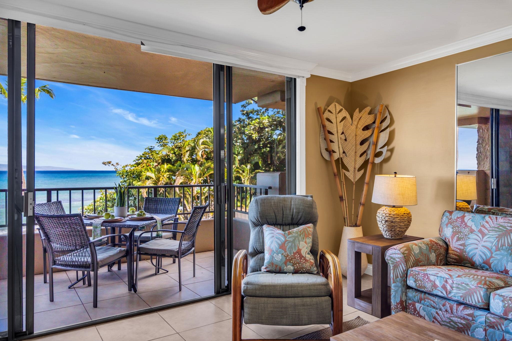 3615 Lower Honoapiilani Road, Unit 222 Lahaina, HI 96761 - Photo 45 of 50 a living room with furniture and a potted plant