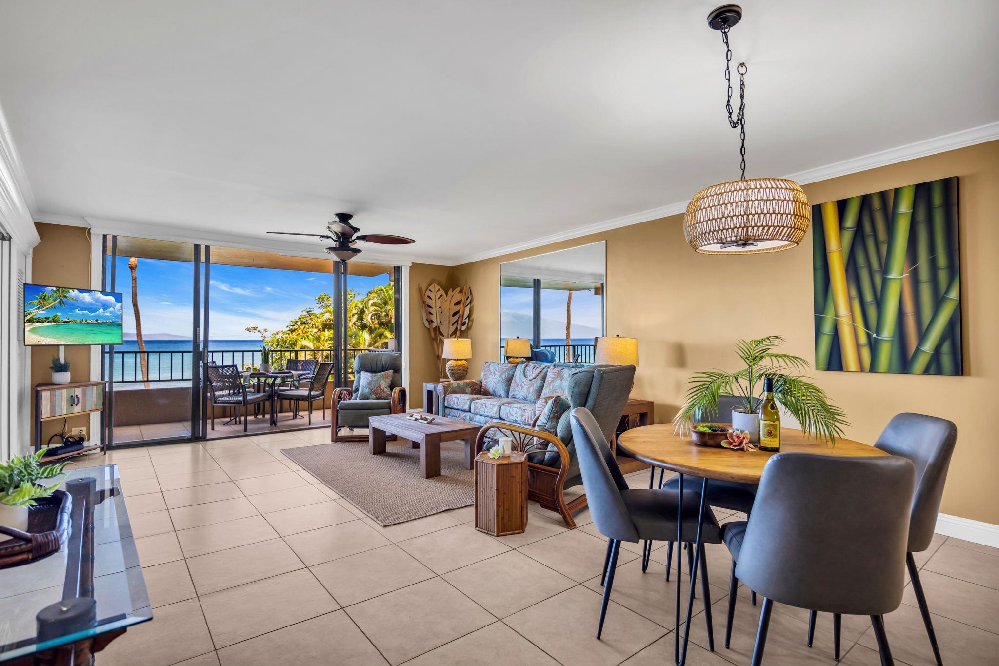 3615 Lower Honoapiilani Road, Unit 222 Lahaina, HI 96761 - Photo 50 of 50 a dining room with furniture a chandelier and window