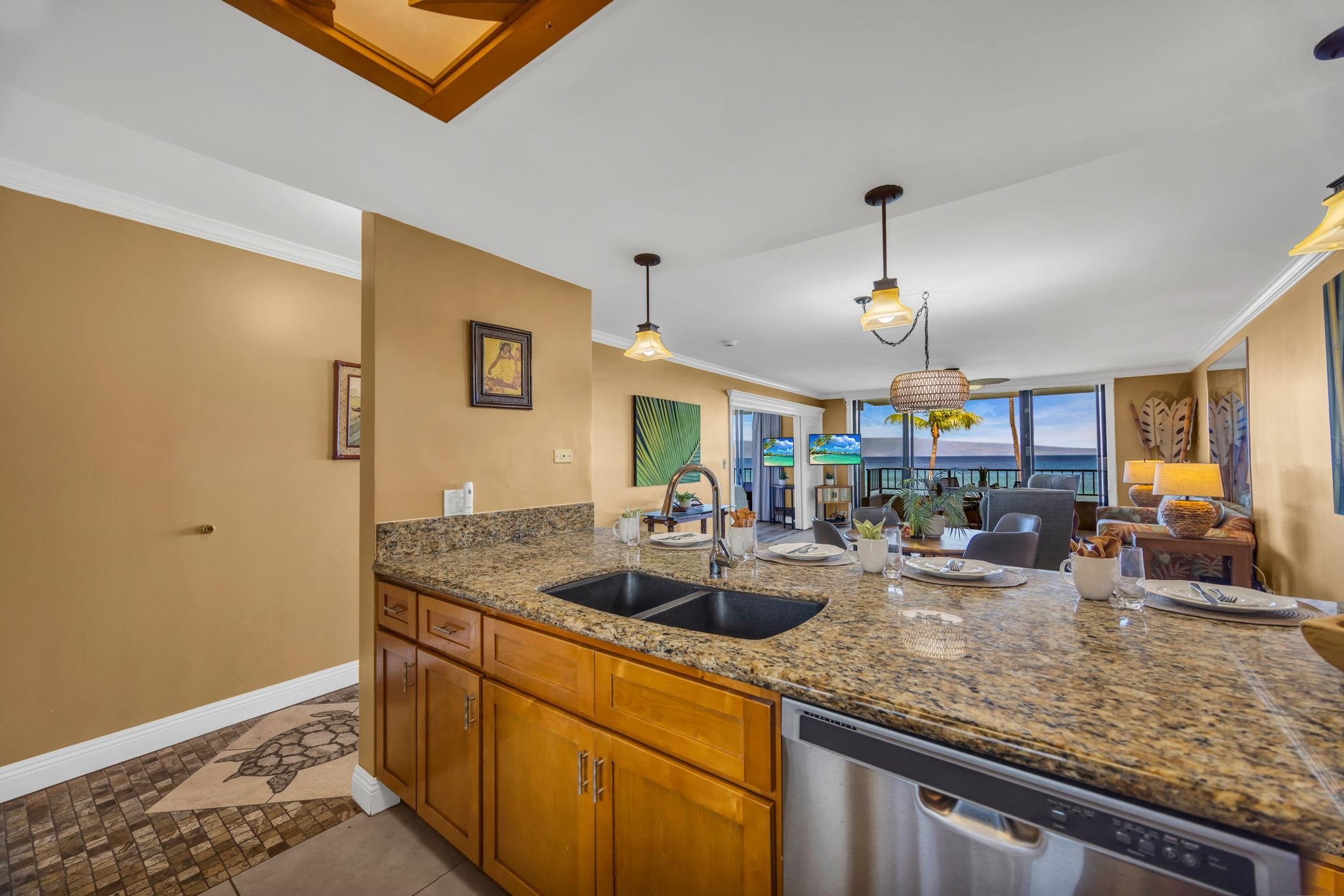 3615 Lower Honoapiilani Road, Unit 222 Lahaina, HI 96761 - Photo 8 of 50 a kitchen with sink and view of living room