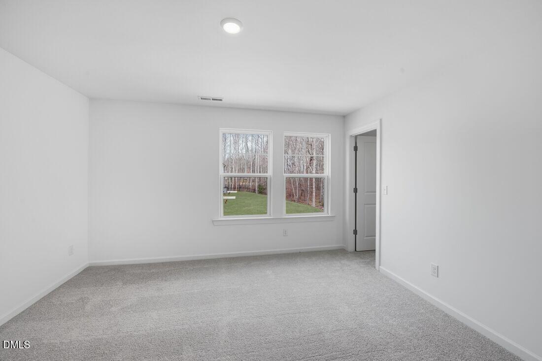 1208 Condor Jct Road Wendell, NC 27591 - Photo 17 of 57 an empty room with a window
