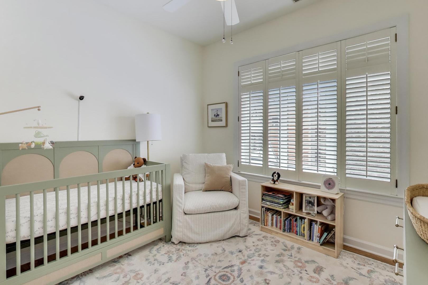 3616 North Janssen Avenue, Unit 2S Chicago, IL 60613 - Photo 13 of 22 a bedroom with furniture and a window
