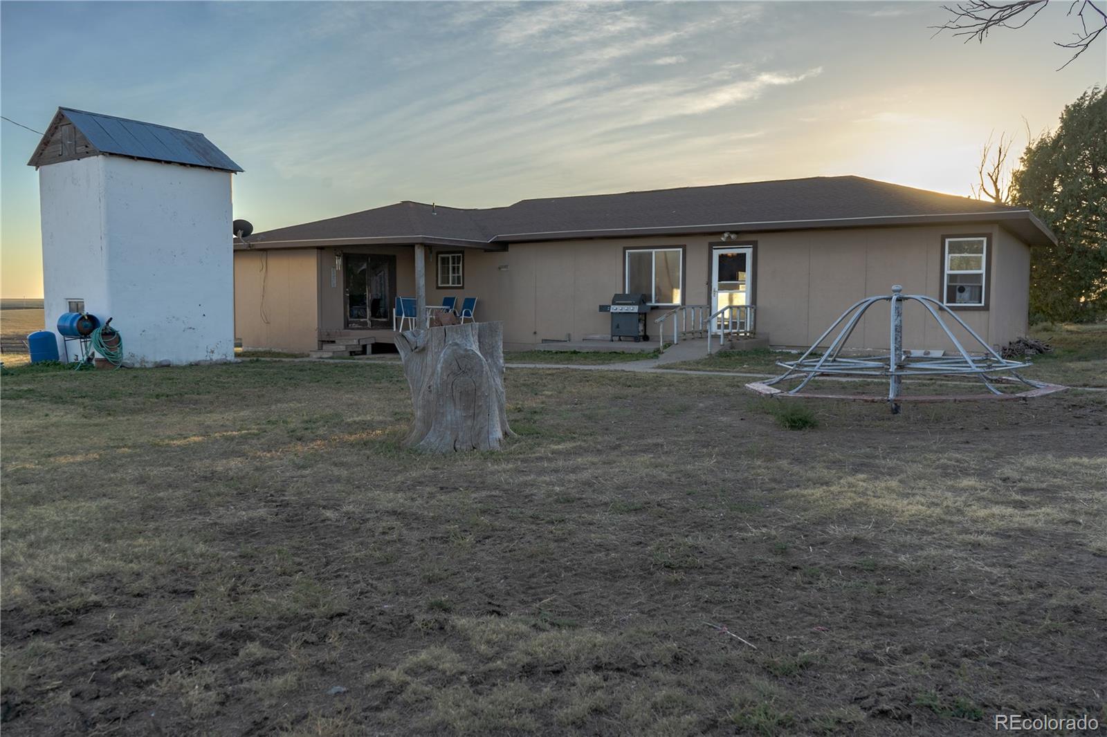 17150 County Rd PP Wray, CO 80758 - Photo 1 of 48 a front view of a house with a yard