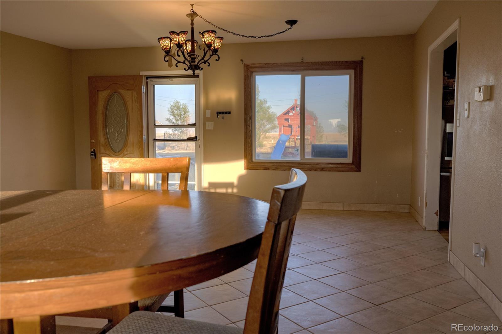 17150 County Rd PP Wray, CO 80758 - Photo 23 of 48 a dining room with furniture and window