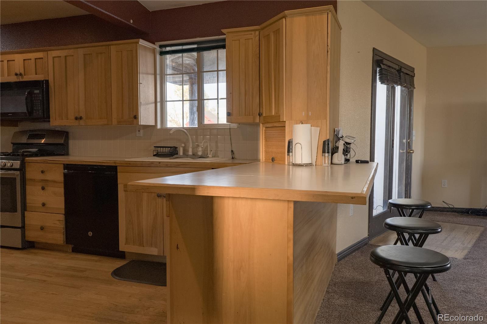 17150 County Rd PP Wray, CO 80758 - Photo 25 of 48 a kitchen with sink cabinets and appliances