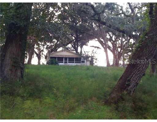 4245 Marsh Road DeLand, FL 32724 - Photo 1 of 1 a view of a house with a backyard