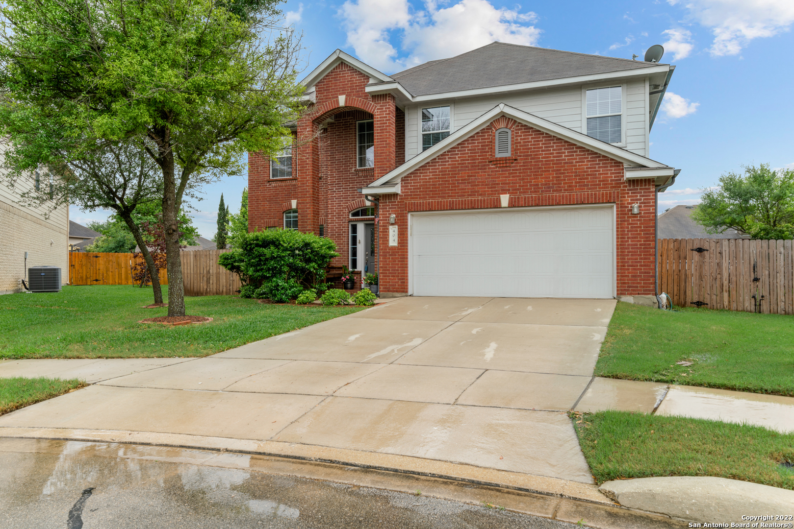 404 Circle Star Road Schertz, TX 78154 - Photo 1 of 1 a front view of a house with a yard and garage