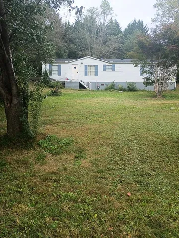 a view of a terrace with a lake view