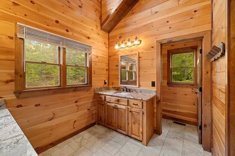a bathroom with a sink and a shower