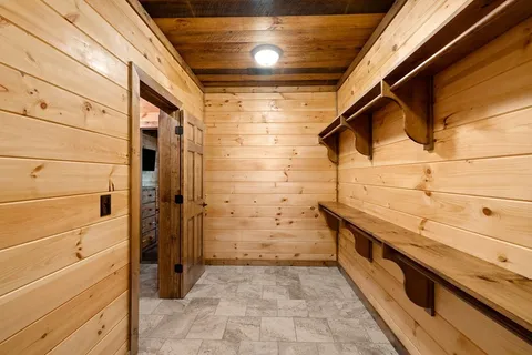 a kitchen with a stove and a window