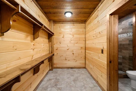 a view of a balcony with wooden floor