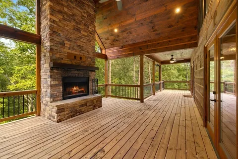 a view of a balcony with wooden floor