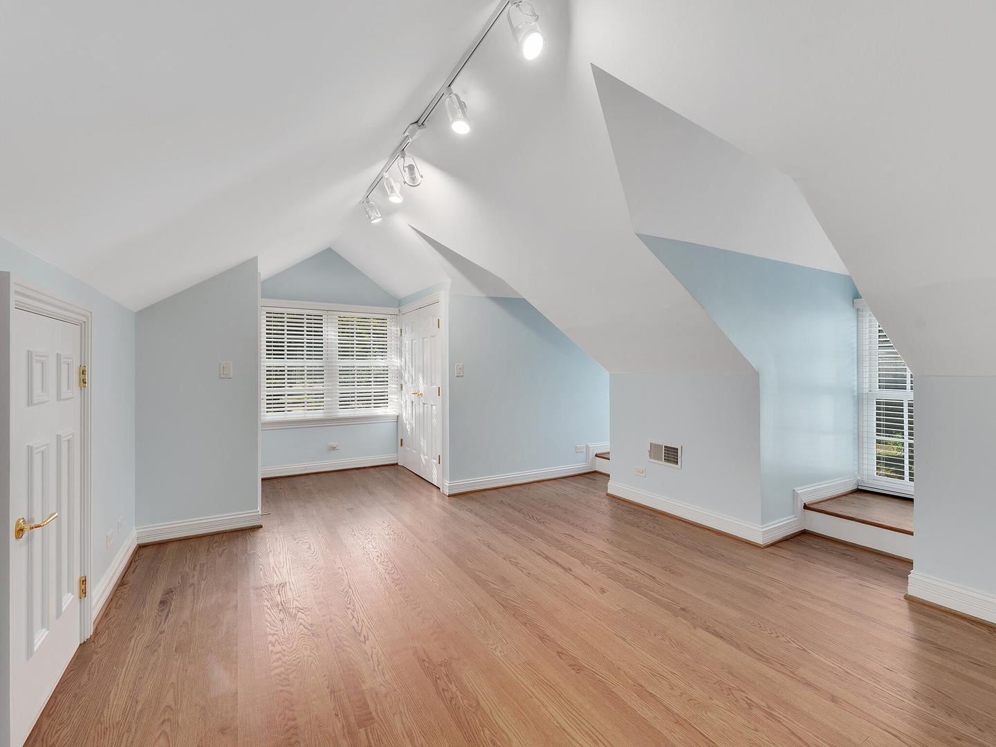 237 North County Line Road Hinsdale, IL 60521 - Photo 18 of 25 wooden floor in an empty room with a window