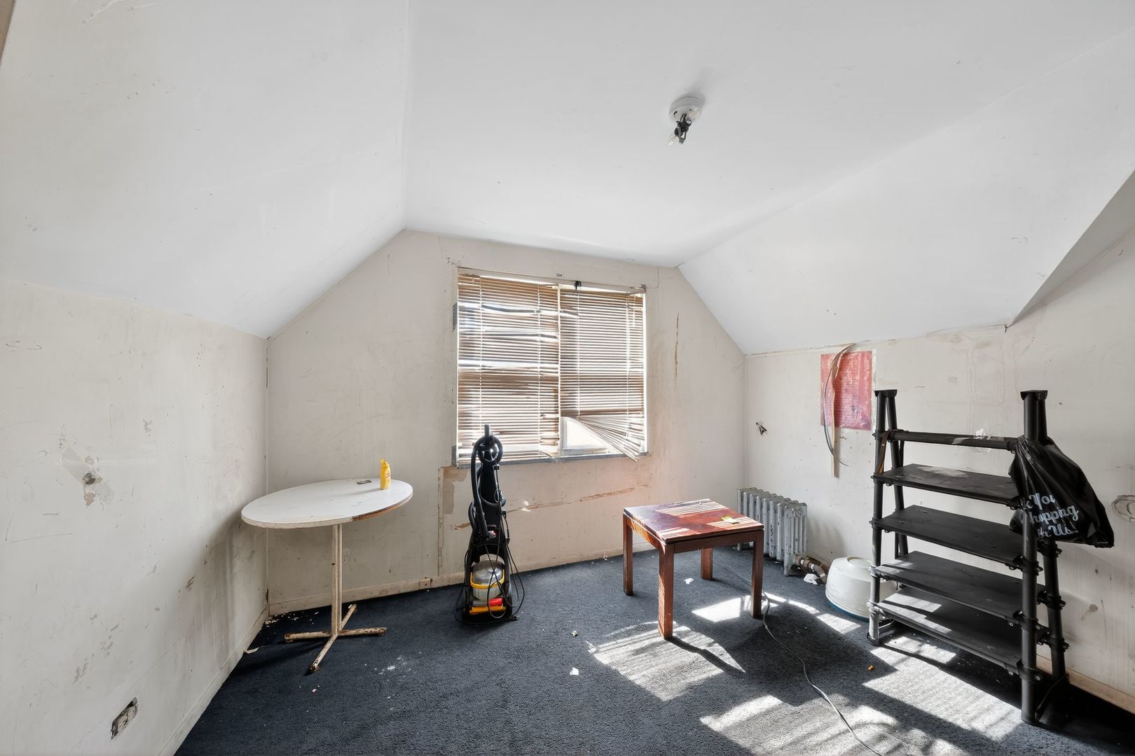6731 South Aberdeen Street Chicago, IL 60621 - Photo 12 of 13 a living room with furniture and a window