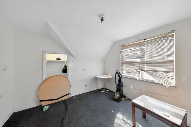 a room with furniture and a window