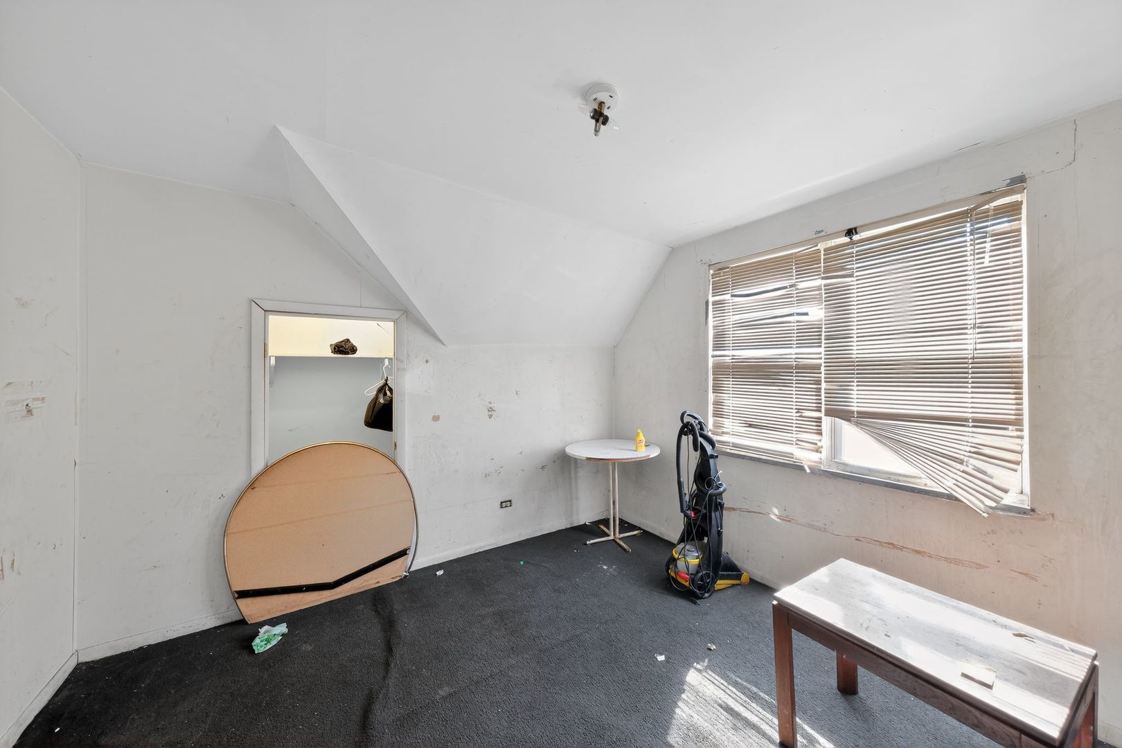 6731 South Aberdeen Street Chicago, IL 60621 - Photo 13 of 13 a room with furniture and a window