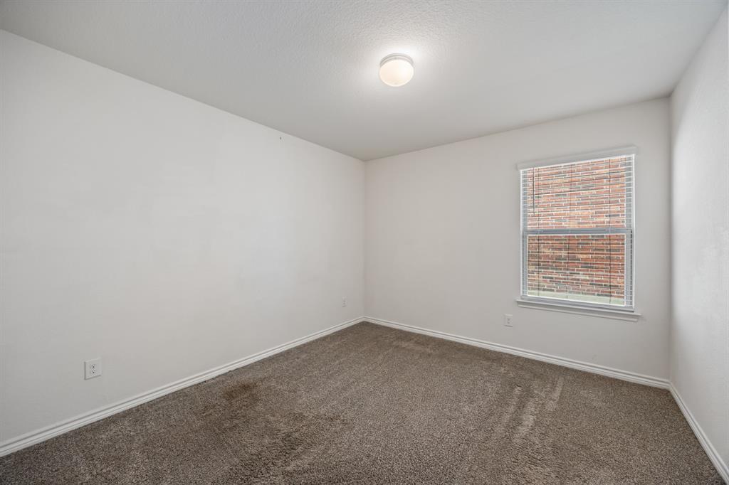 620 Gunsmoke Trail Princeton, TX 75407 - Photo 16 of 37 an empty room with a window
