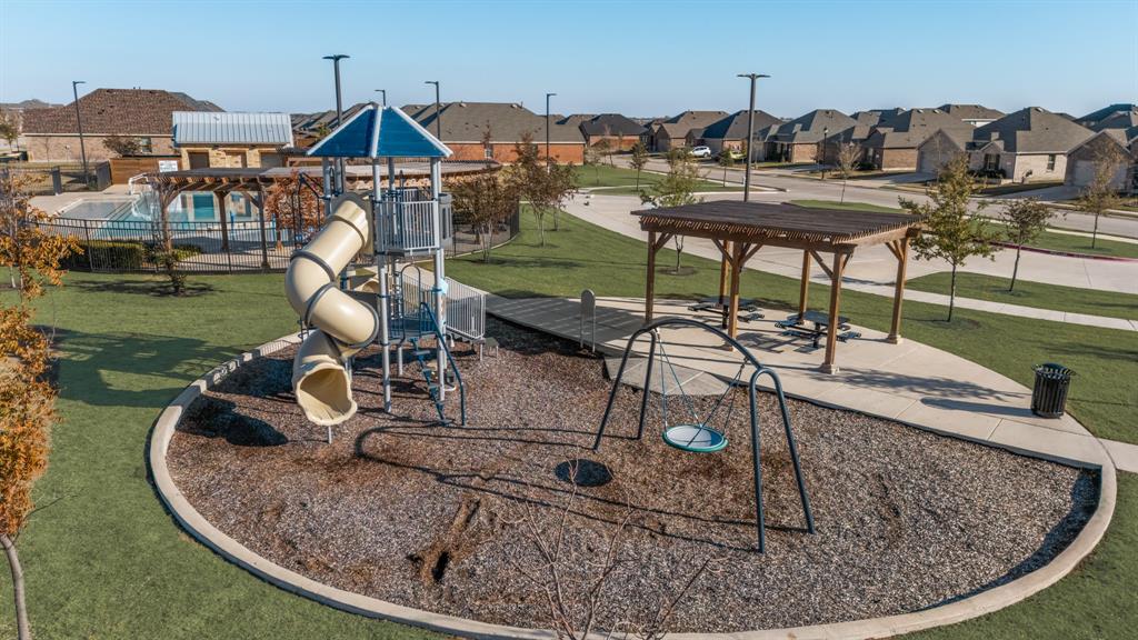 620 Gunsmoke Trail Princeton, TX 75407 - Photo 28 of 37 a view of a house with backyard porch and sitting area