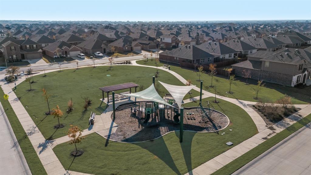620 Gunsmoke Trail Princeton, TX 75407 - Photo 29 of 37 a view of a swimming pool with lawn chairs