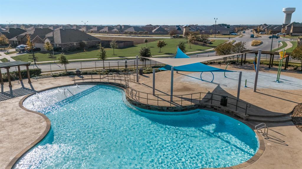 620 Gunsmoke Trail Princeton, TX 75407 - Photo 31 of 37 a view of a swimming pool with a patio