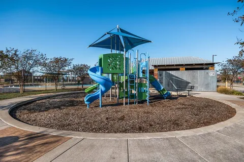 a view of a bench in the garden