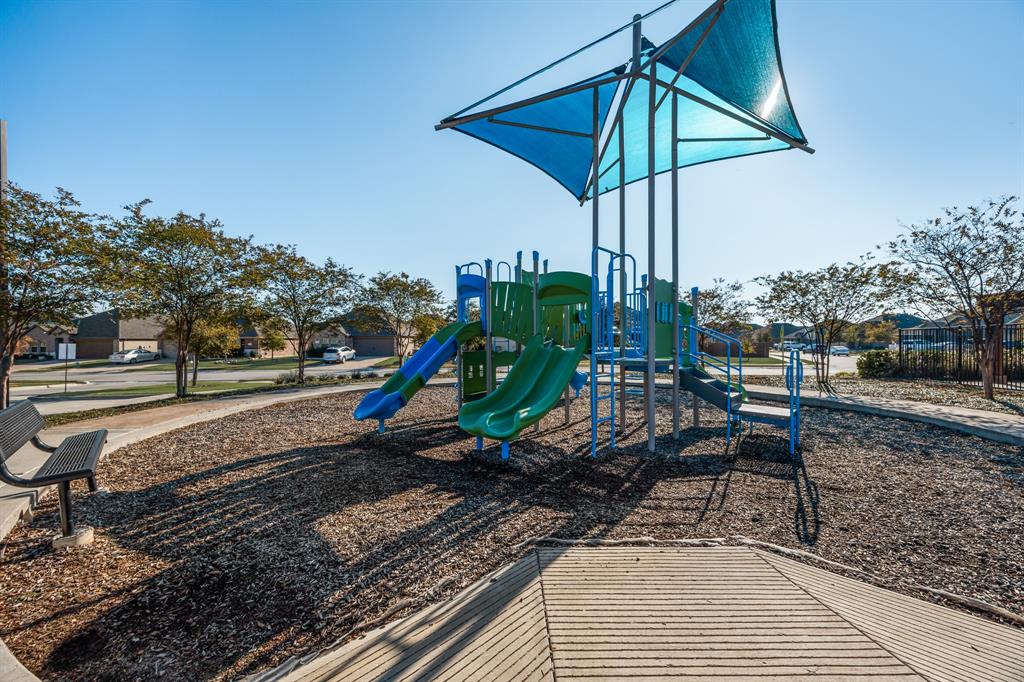 620 Gunsmoke Trail Princeton, TX 75407 - Photo 35 of 37 a view of a bench in the garden