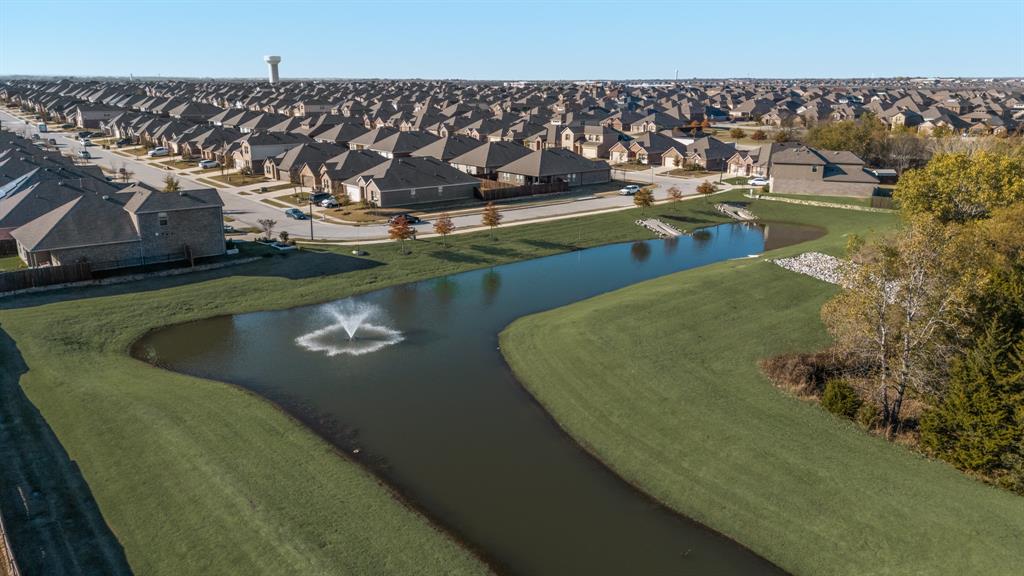 620 Gunsmoke Trail Princeton, TX 75407 - Photo 37 of 37 a view of a swimming pool with a lake view