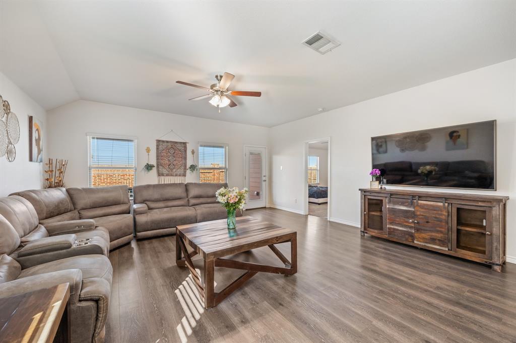 620 Gunsmoke Trail Princeton, TX 75407 - Photo 6 of 37 a living room with furniture and a flat screen tv