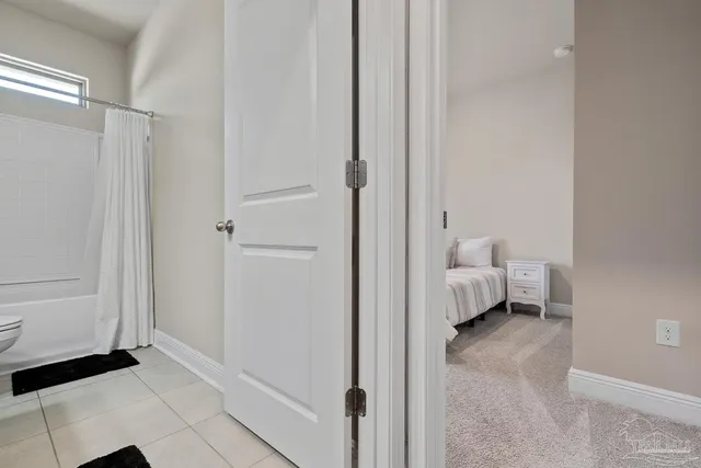 a view of backyard with outdoor seating and kitchen view