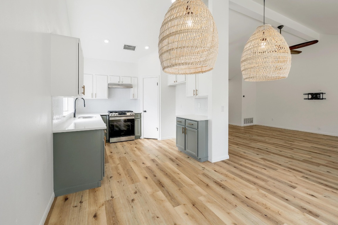 1205 Rambling Trail Cedar Park, TX 78613 - Photo 9 of 38 Dining space off kitchen featuring stainless steel gas range with vented exhaust hood, and tasteful updates.