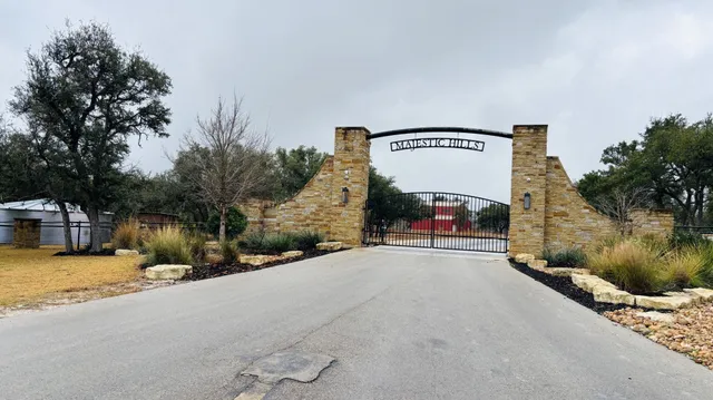 a view of a street with a building in the background