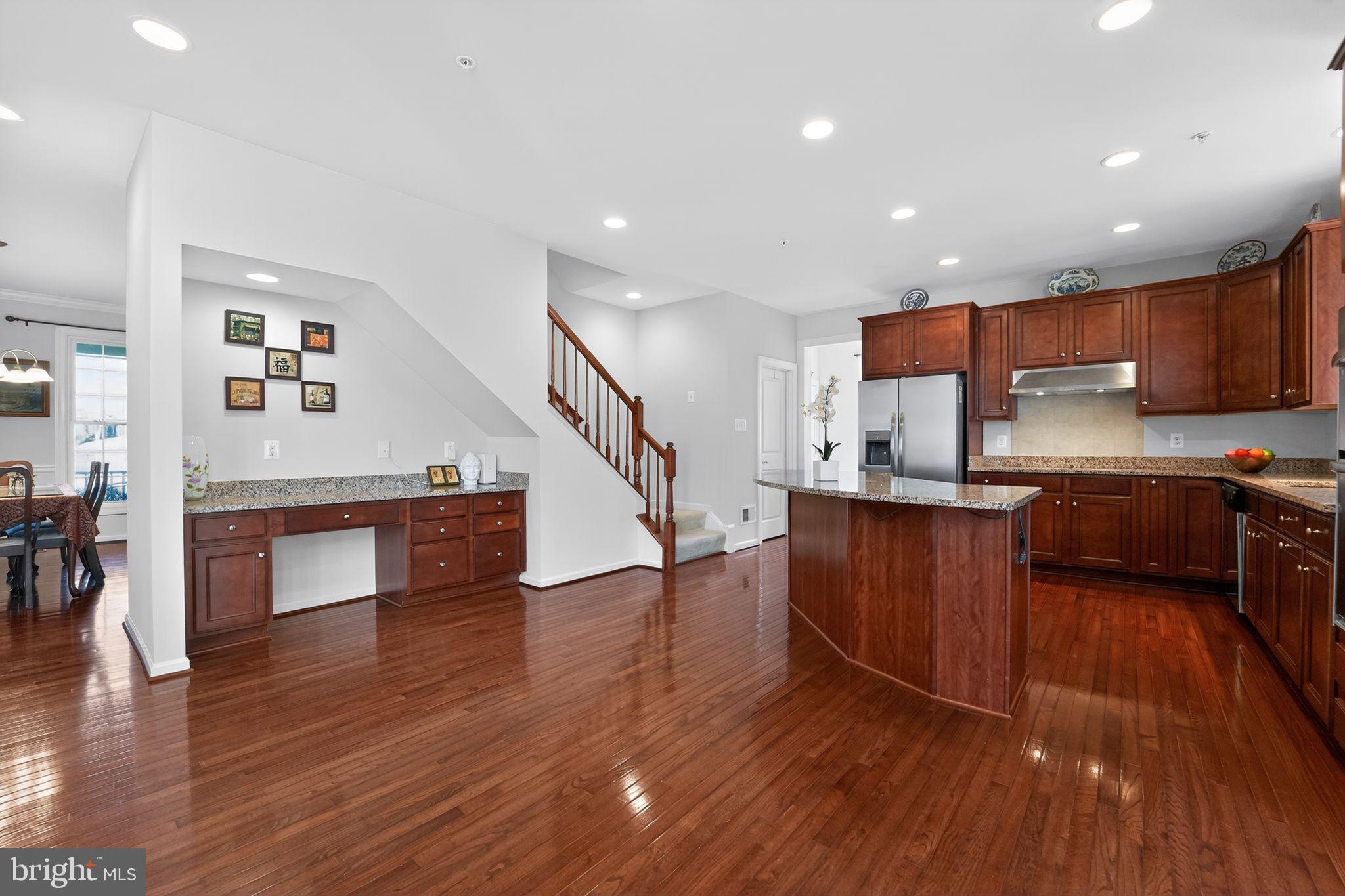 12039 Open Run Road Ellicott City, MD 21042 - Photo 23 of 67 Spacious kitchen with rich wood accents.