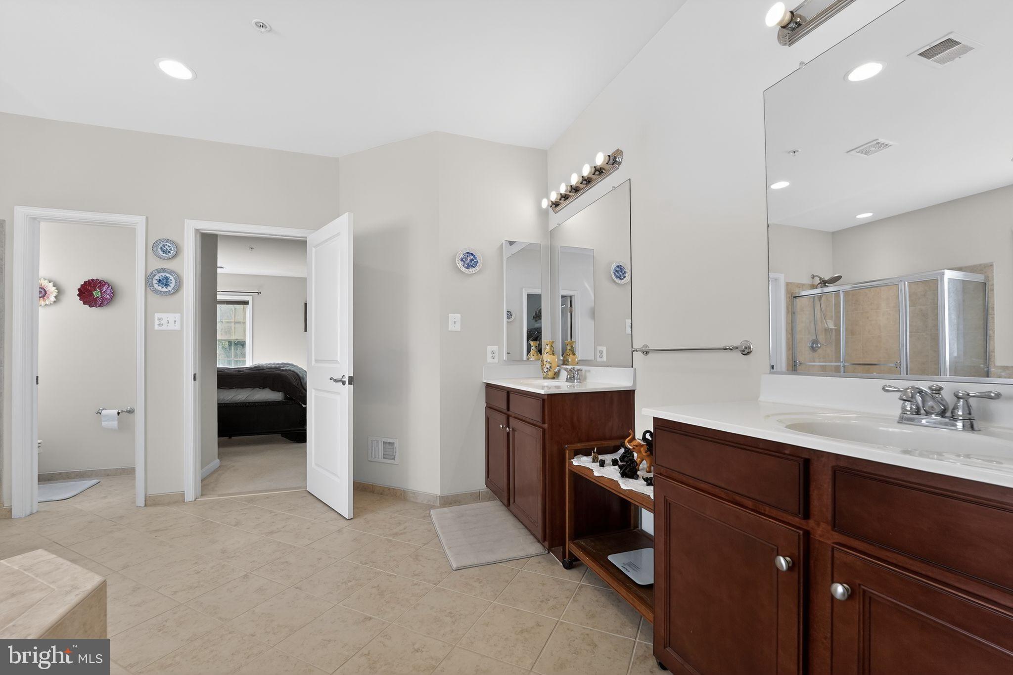 12039 Open Run Road Ellicott City, MD 21042 - Photo 41 of 67 Spacious, modern bathroom retreat.