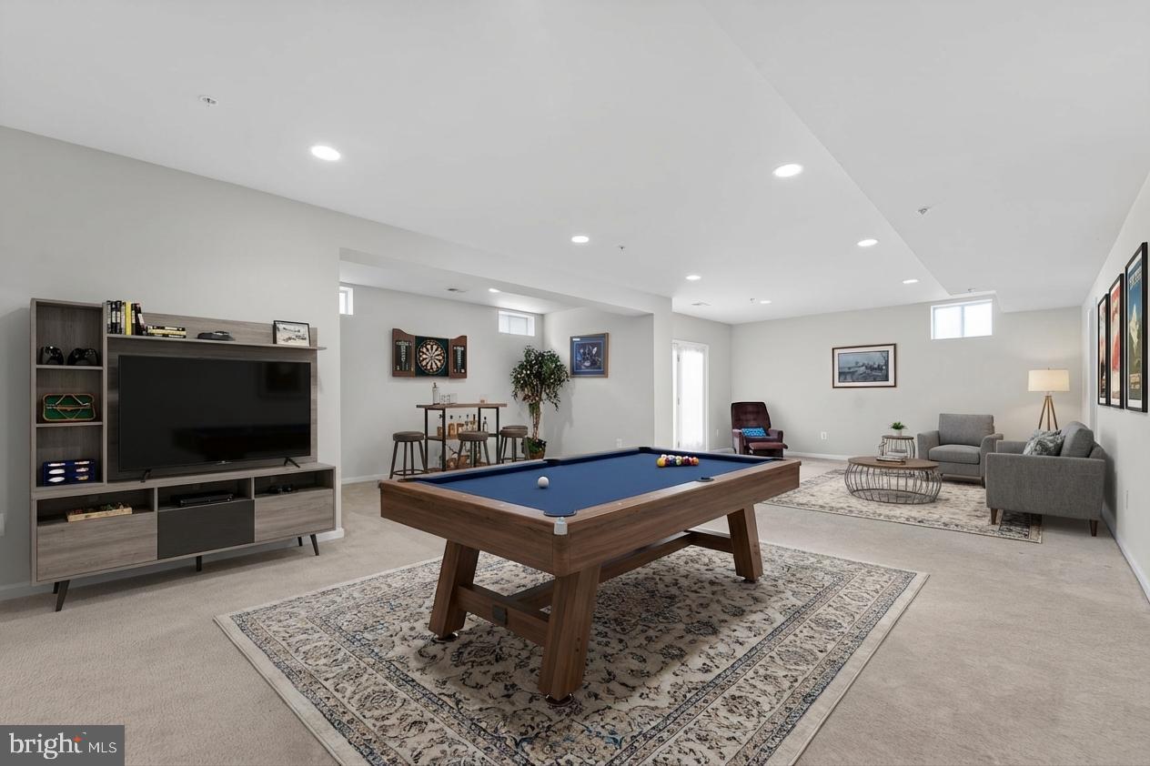 12039 Open Run Road Ellicott City, MD 21042 - Photo 55 of 67 Spacious game room with modern flair.