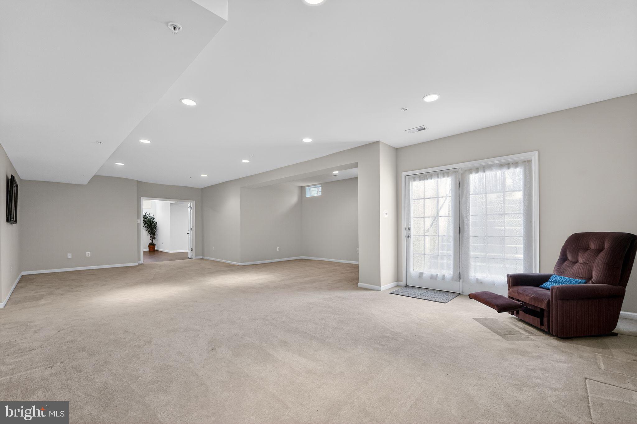 12039 Open Run Road Ellicott City, MD 21042 - Photo 56 of 67 Spacious, light-filled living area.