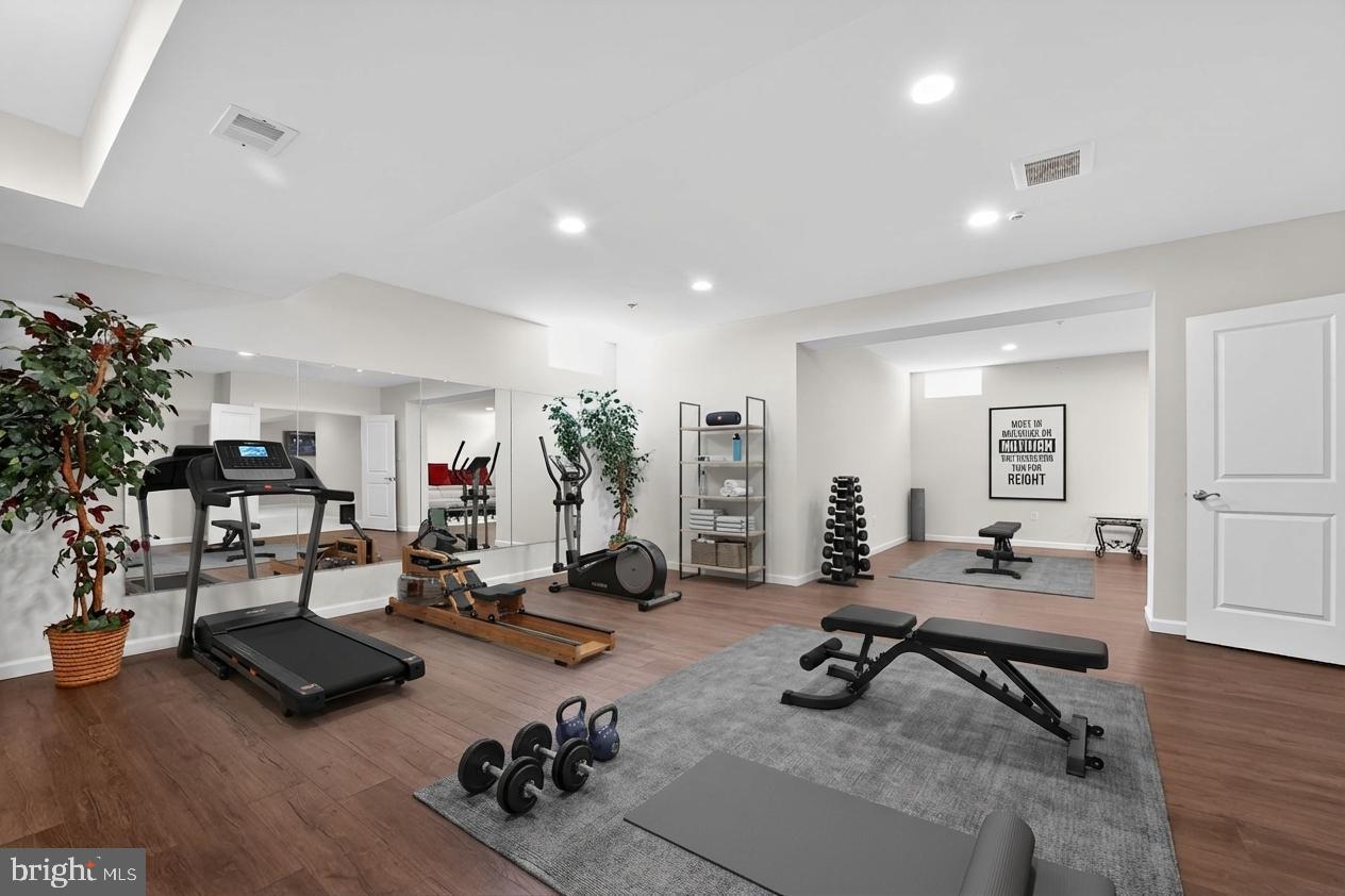 12039 Open Run Road Ellicott City, MD 21042 - Photo 63 of 67 Modern home gym for fitness enthusiasts.