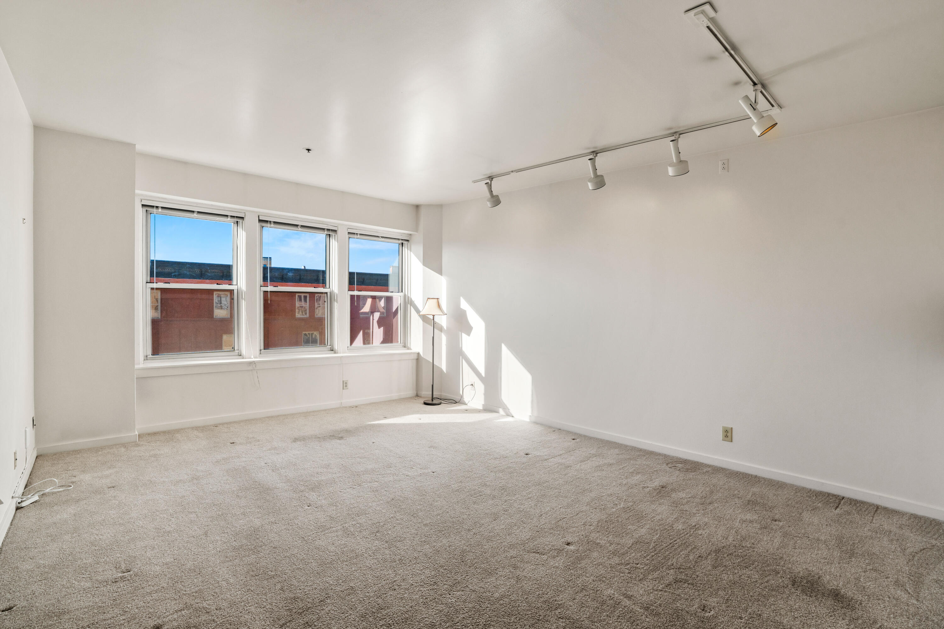 234 North Broadway, Unit 608 Milwaukee, WI 53202 - Photo 10 of 25 Lg Great Living Rm West Windows