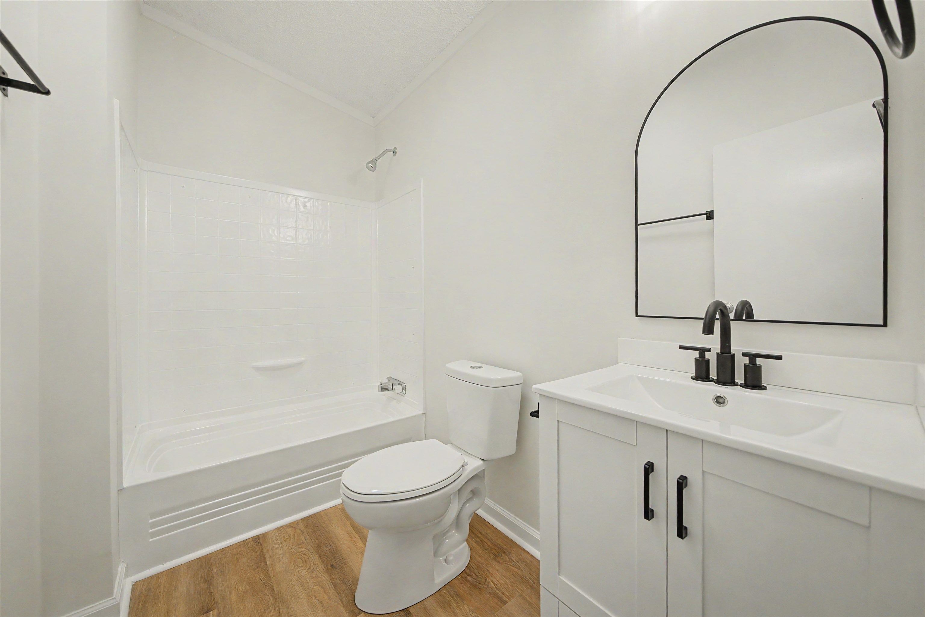 890 Burks Road Savannah, TN 38372 - Photo 20 of 40 a bathroom with a sink a toilet and shower