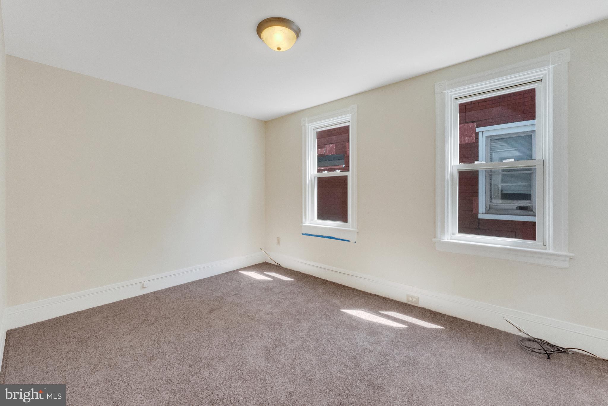 114 Delaware Avenue Riverside, NJ 08075 - Photo 12 of 21 an empty room with windows