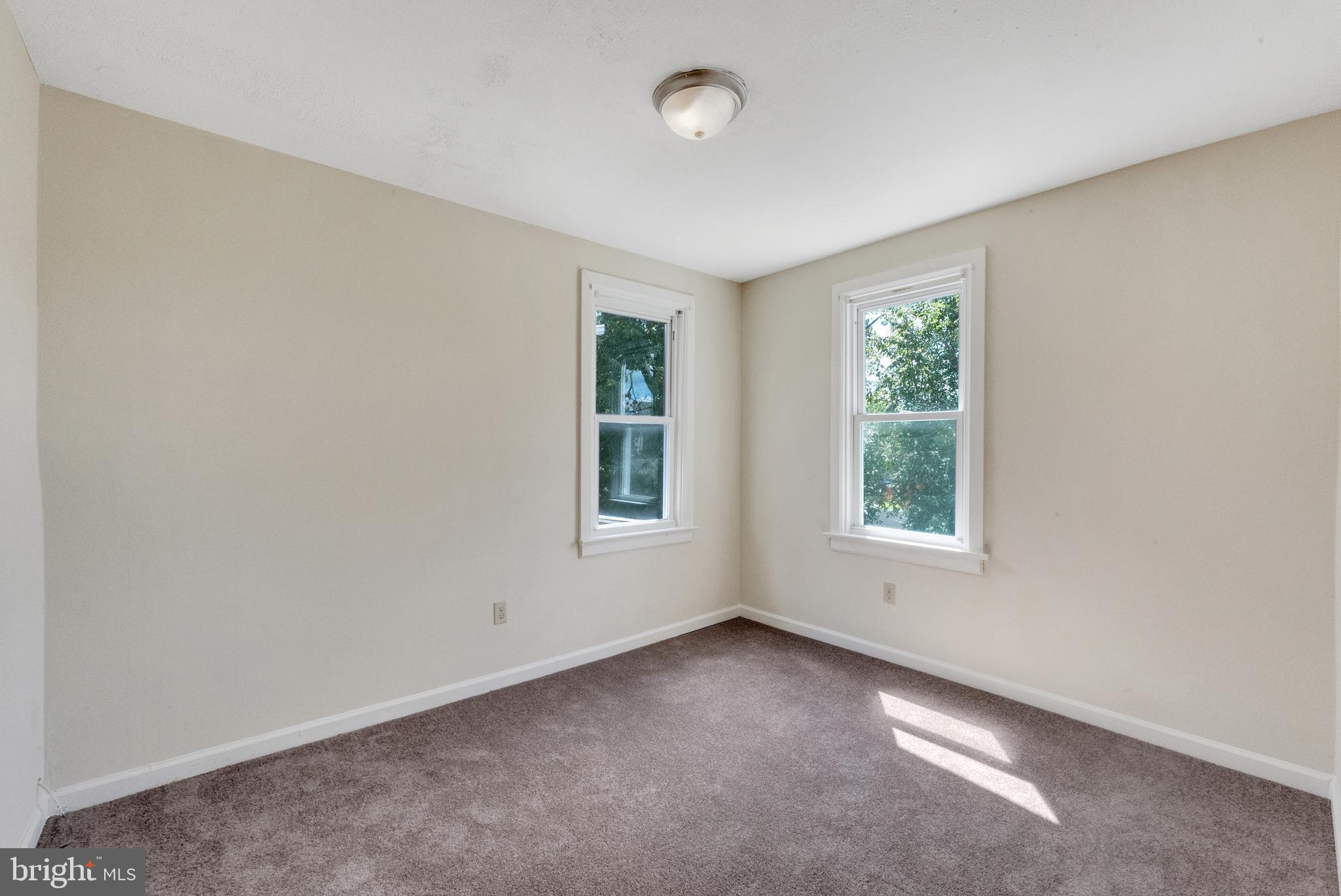 114 Delaware Avenue Riverside, NJ 08075 - Photo 13 of 21 an empty room with windows