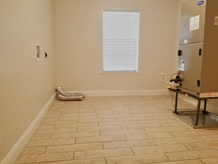 1562 Bay Grove Road Freeport, FL 32439 - Photo 11 of 18 a bathroom with a sink toilet and a window