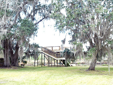 1562 Bay Grove Road Freeport, FL 32439 - Photo 14 of 18 a view of a house with a yard