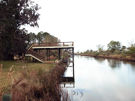 1562 Bay Grove Road Freeport, FL 32439 - Photo 15 of 18 a view of a house with a lake