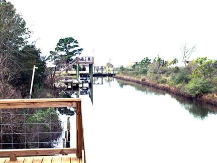 1562 Bay Grove Road Freeport, FL 32439 - Photo 17 of 18 a view of a lake from a balcony