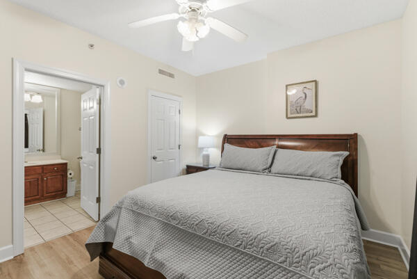 17643 Front Beach Road, Unit 1806 Panama City Beach, FL 32413 - Photo 21 of 25 a large bed in a white room