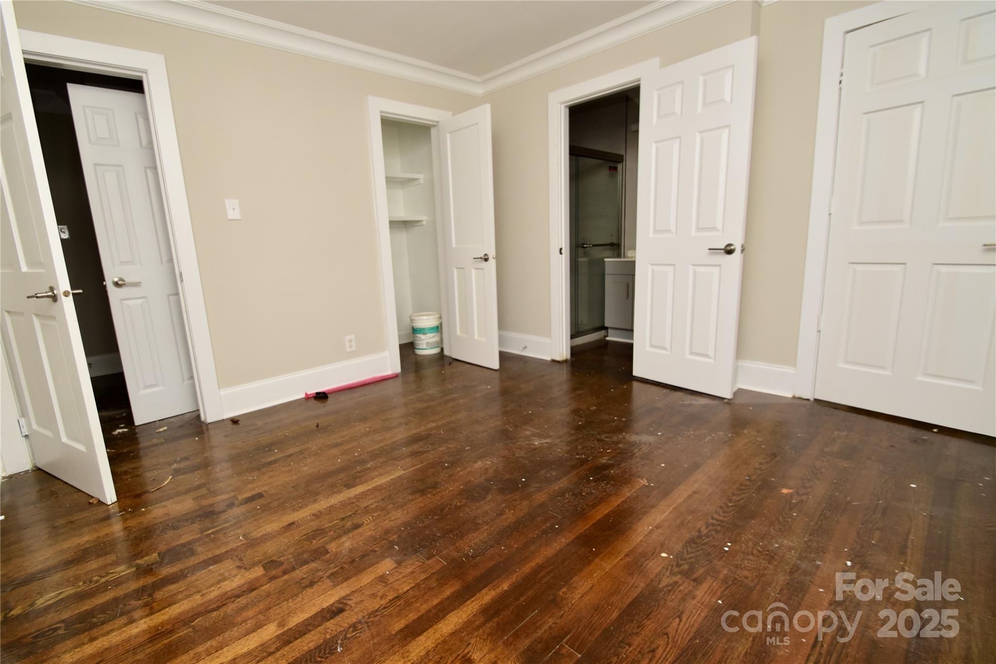 506 East Ridge Street Kings Mountain, NC 28086 - Photo 11 of 23 an empty room with wooden floor and entrance