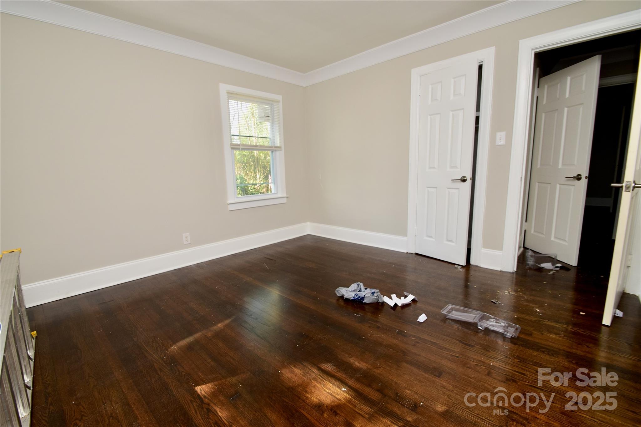 506 East Ridge Street Kings Mountain, NC 28086 - Photo 15 of 23 an empty room with wooden floor