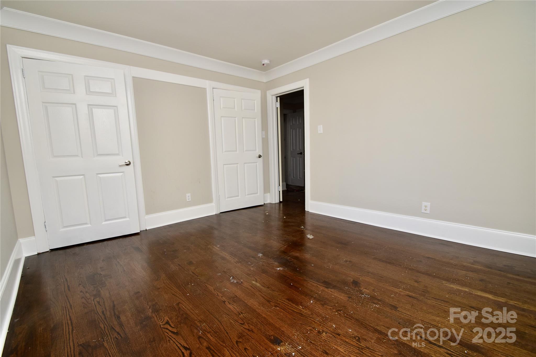 506 East Ridge Street Kings Mountain, NC 28086 - Photo 17 of 23 a view of an empty room with wooden floor