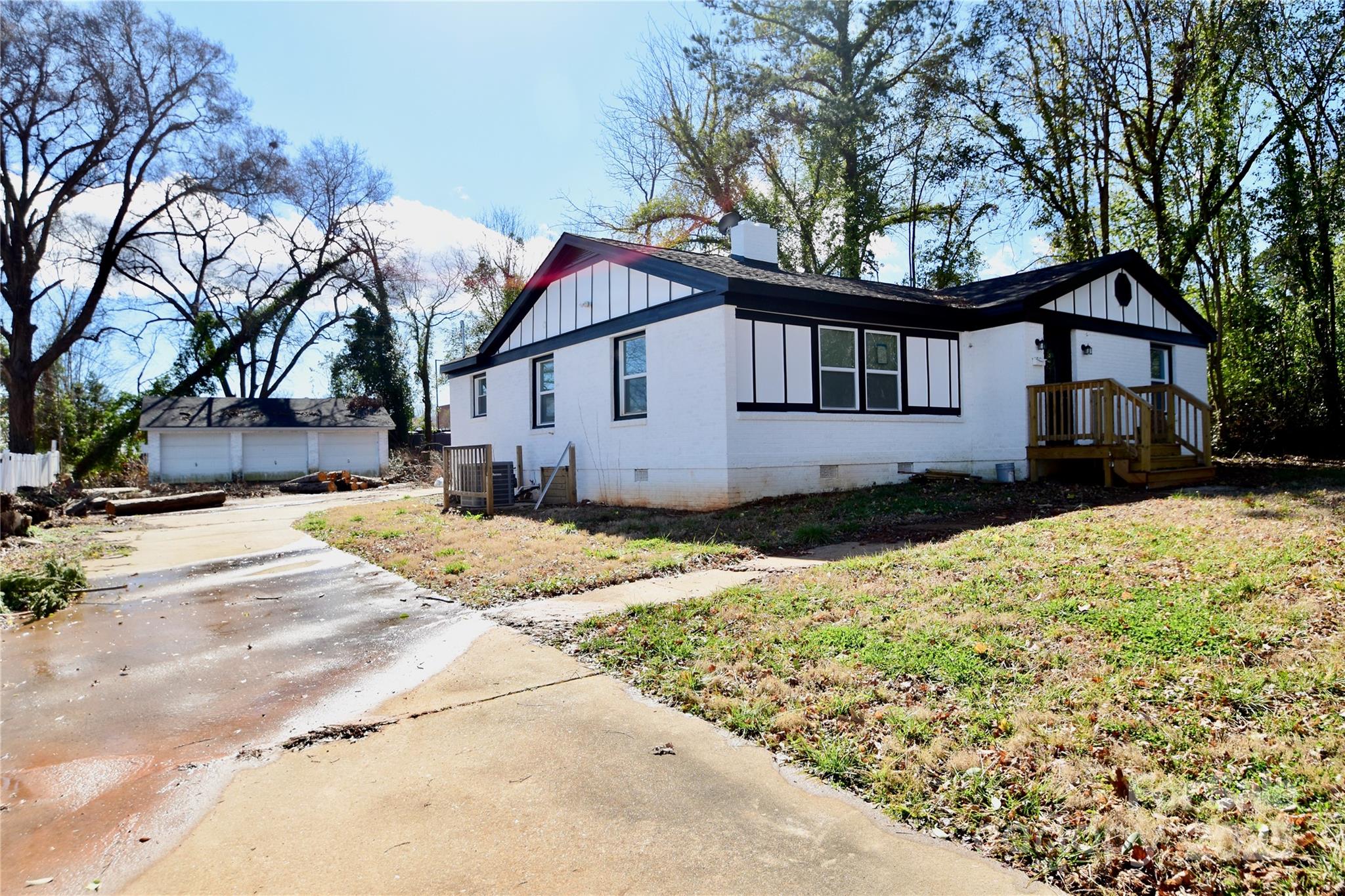 506 East Ridge Street Kings Mountain, NC 28086 - Photo 23 of 23 a view of a white house with a yard covered in snow