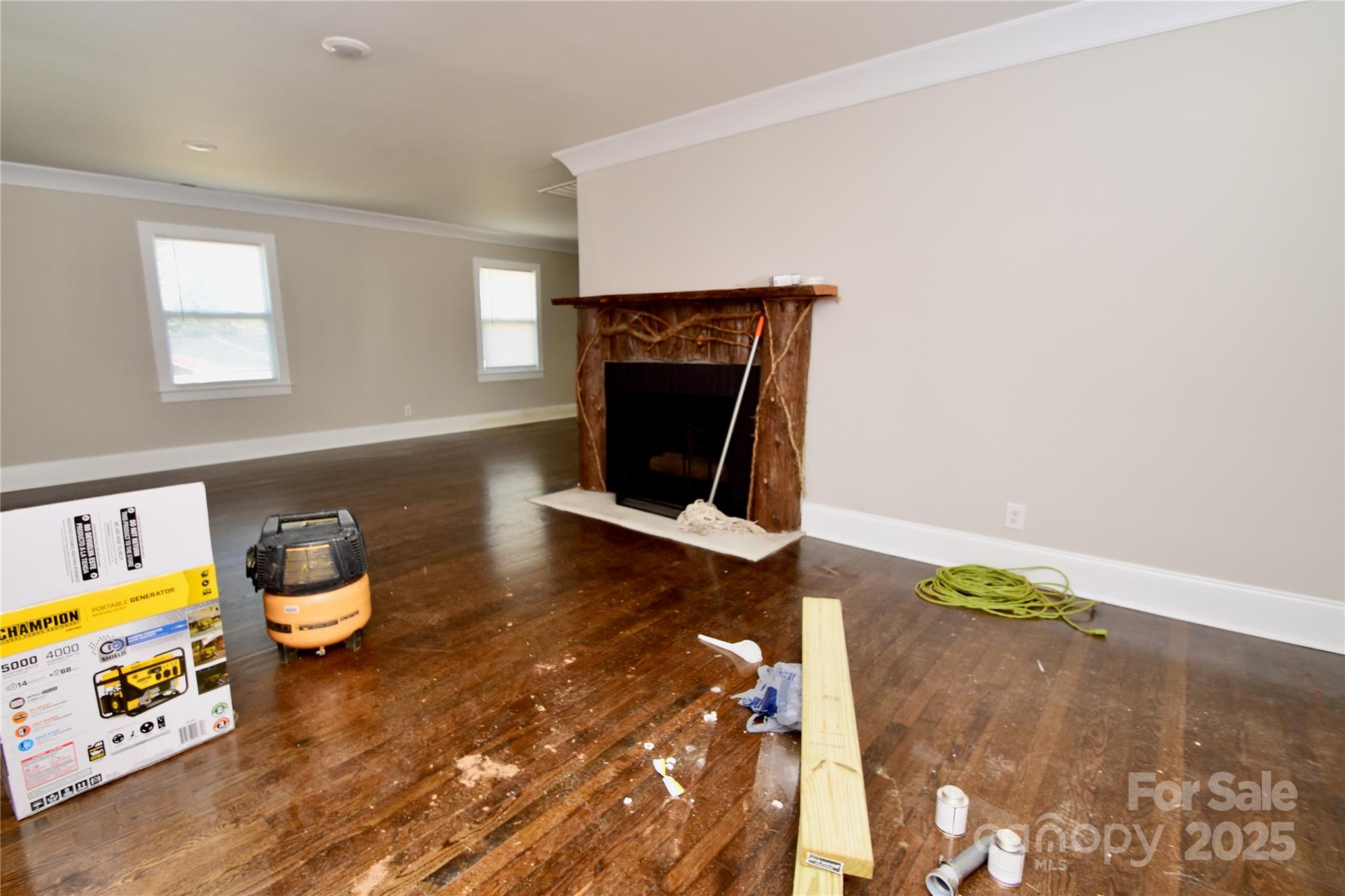 506 East Ridge Street Kings Mountain, NC 28086 - Photo 4 of 23 a living room with furniture and a fireplace