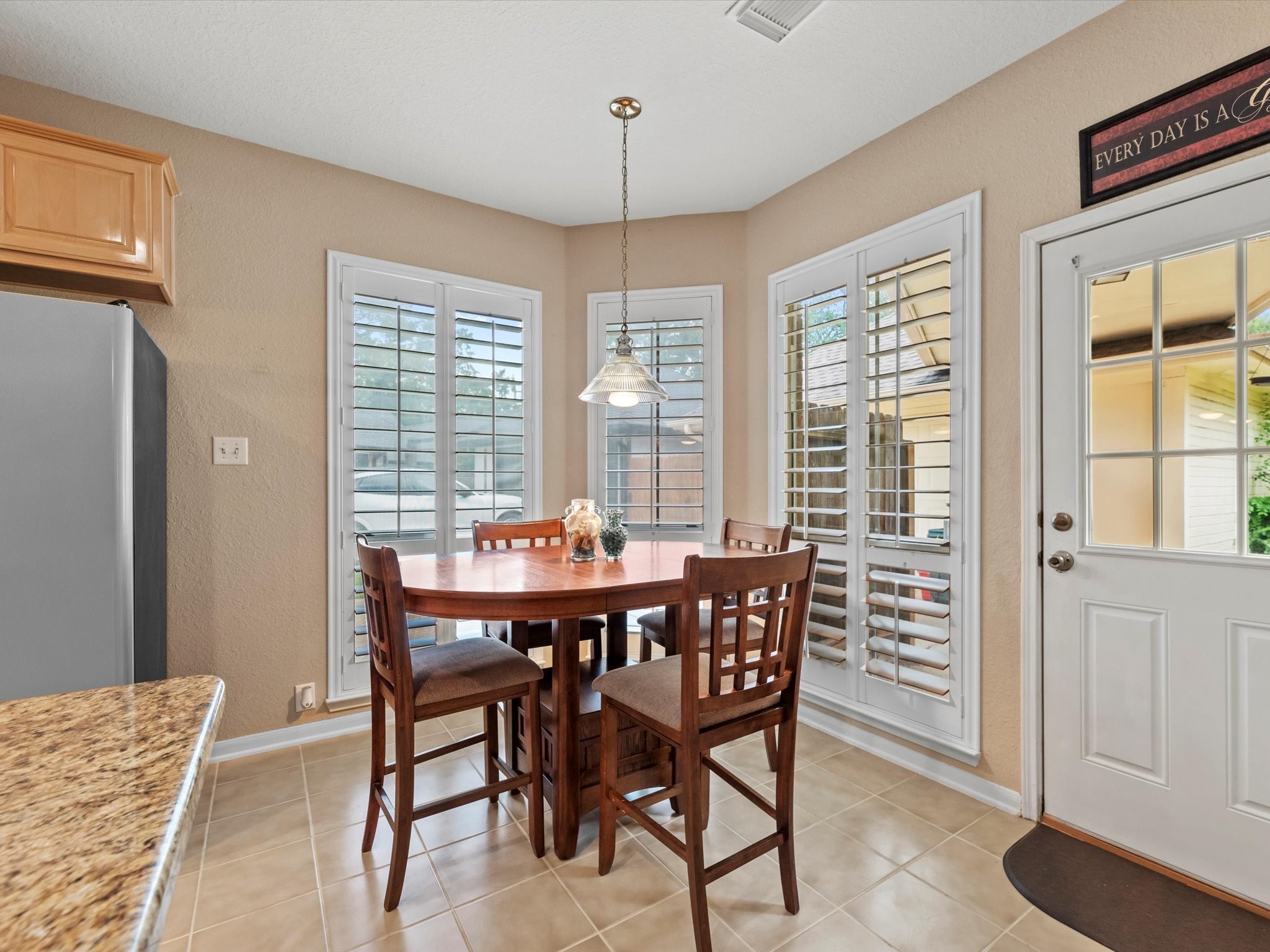 911 Chinni Court Houston, TX 77094 - Photo 13 of 31 a view of a dining room with furniture window and outside view